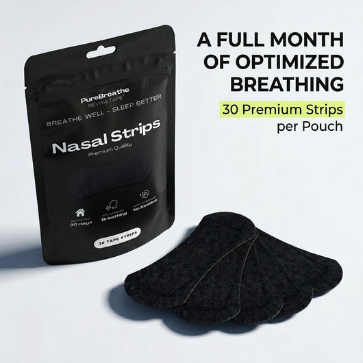Black nasal strip packaging with strips on a light gray background